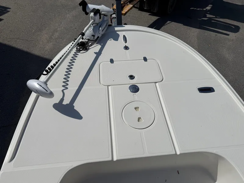 Slide: The Image of 2015 Spyder Boats FX17 FLICKER deck with trolling motor, showcasing clean design. - 8