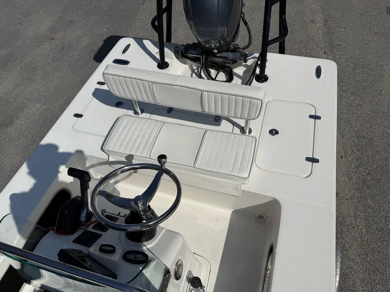 Slide: The Image of 2015 Spyder Boats FX17 FLICKER interior with steering wheel and seating. - 9