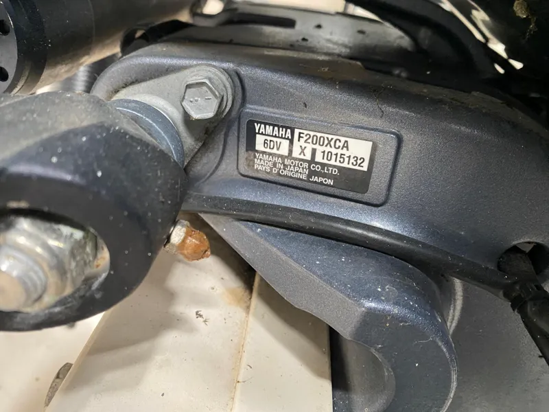 Slide: The Image of Yamaha F200XCA engine on 2021 Grady-White Freedom 275 boat, close-up view. - 31