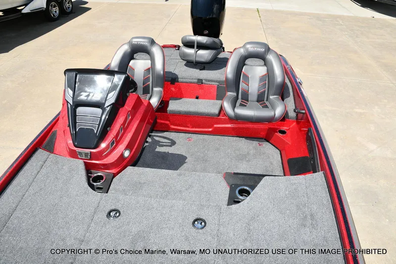 Slide: The Image of 2021 Nitro Z18 boat interior with dual seats and carpeted deck. - 12