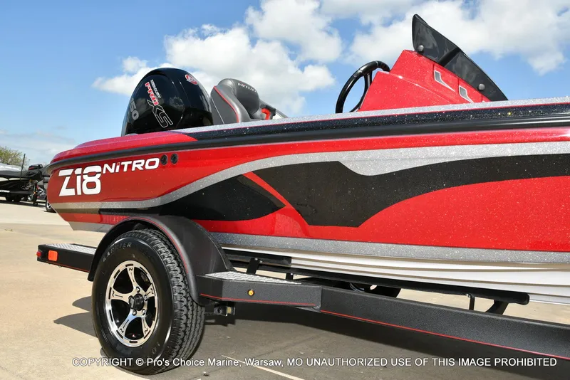 Slide: The Image of 2021 Nitro Z18 boat with 150 Mercury Pro-XS 4 Stroke engine, red and black design. - 18