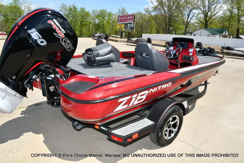 Slide: The Image of 2021 Nitro Z18 boat with 150 Mercury Pro-XS 4 Stroke engine, red exterior. - 19