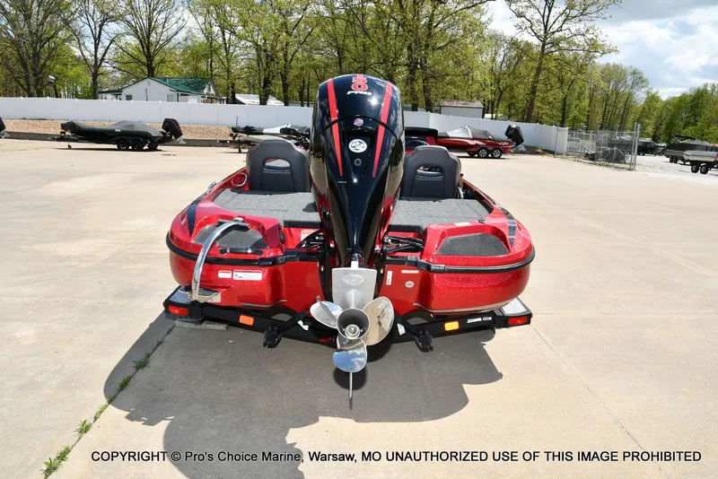 Slide: The Image of 2021 Nitro Z18 boat with 150 Mercury Pro-XS 4 Stroke engine, parked outdoors. - 26