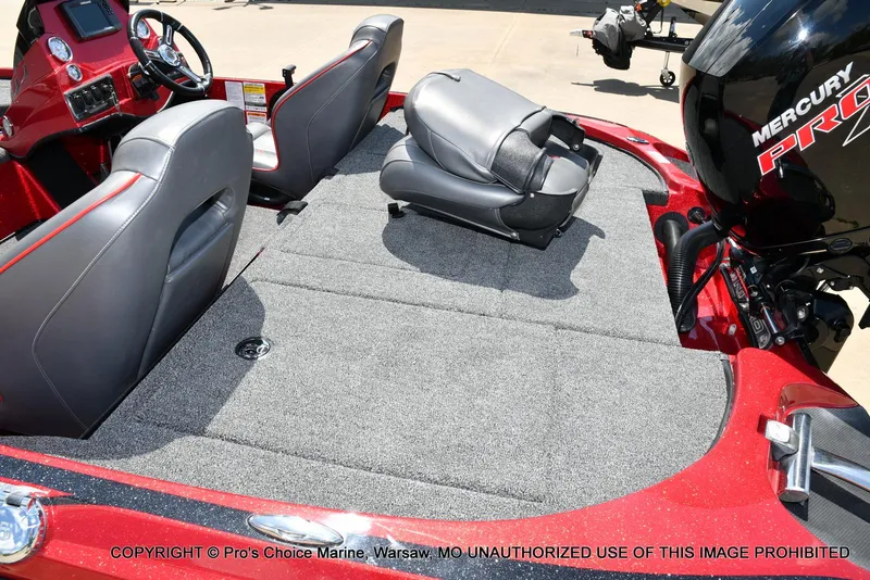 Slide: The Image of 2021 Nitro Z18 boat interior with Mercury Pro-XS engine, featuring gray seating and carpeted deck. - 41