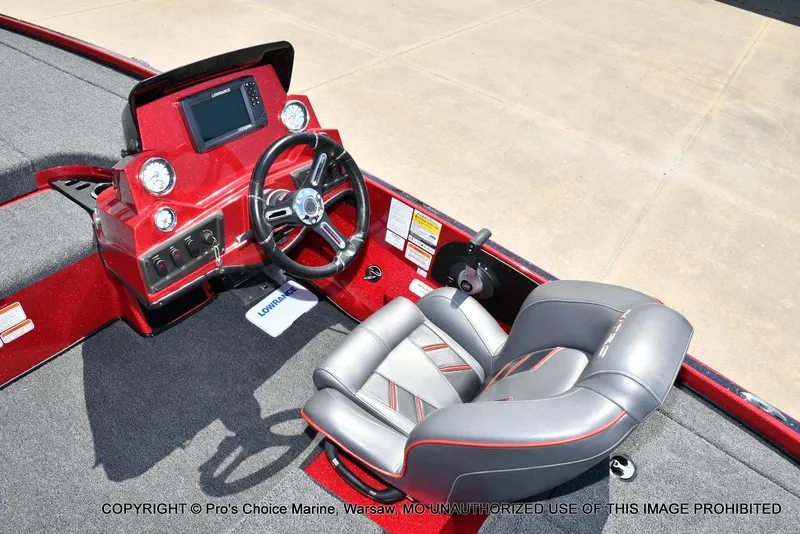 Slide: The Image of 2021 Nitro Z18 boat interior with steering wheel and control panel, featuring a Lowrance display. - 44