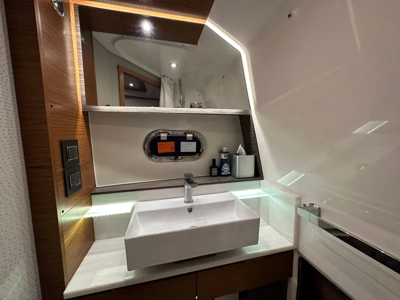 Slide: The Image of Modern bathroom interior of 2020 Tiara Yachts 43 LS with sleek sink and mirror. - 35