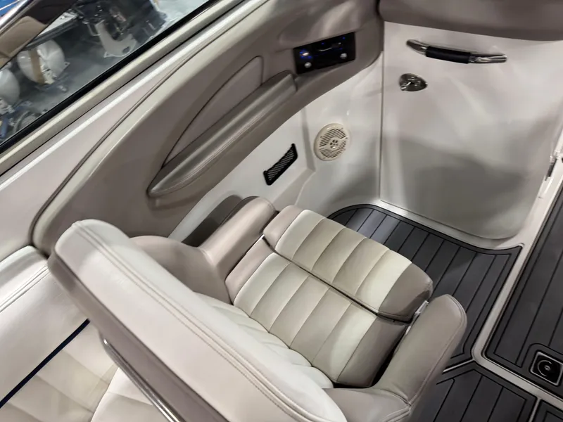 Slide: The Image of 2002 Cobalt 282 BR boat interior with gray seating and sleek design. - 14