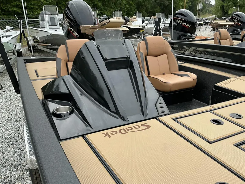 Slide: The Image of 2025 Xpress Hyper-Lift Crappie Series H20 boat with tan seats and black console. - 6