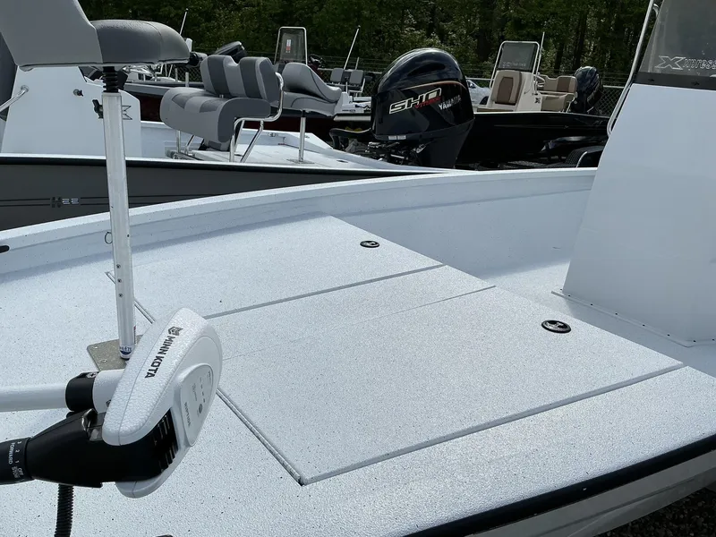 Slide: The Image of 2025 Xpress Hyper-Lift Bay Series 210 BAY-175 HP boat with Yamaha motor, white deck. - 3