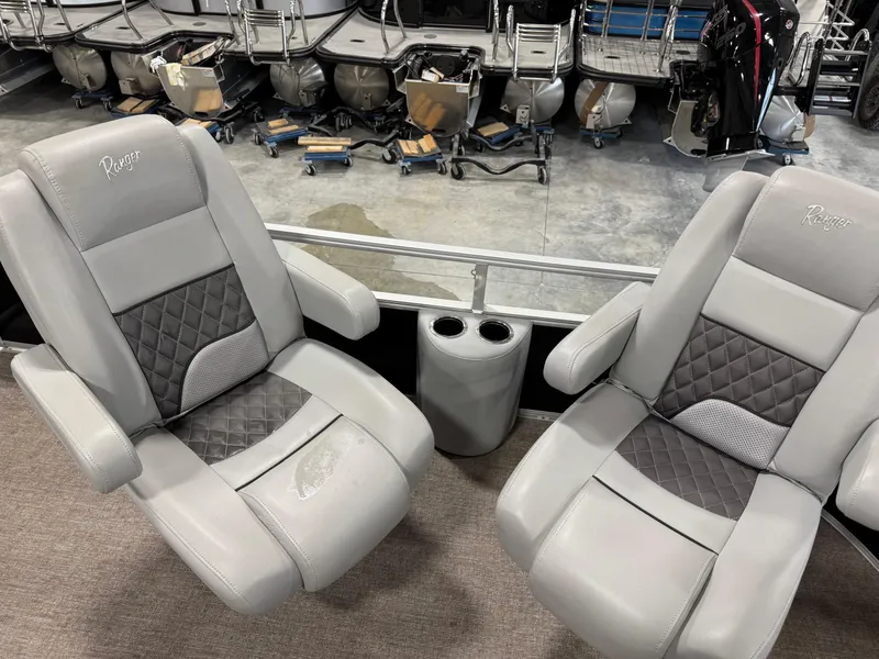 Slide: The Image of Two gray Ranger 223 FC boat seats with cup holders, 2020 model. - 7