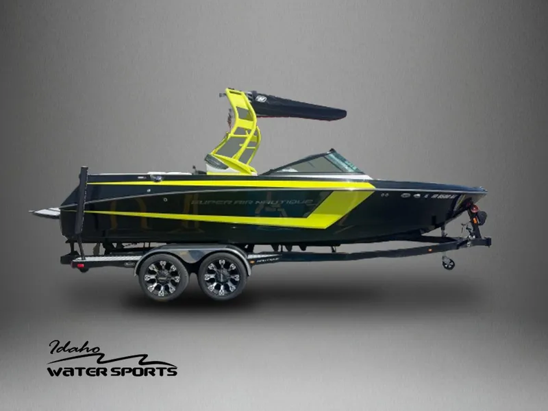 Slide: The Image of 2014 Correct Craft 230 TEAM EDITION boat on trailer, featuring sleek design and vibrant colors. - 1