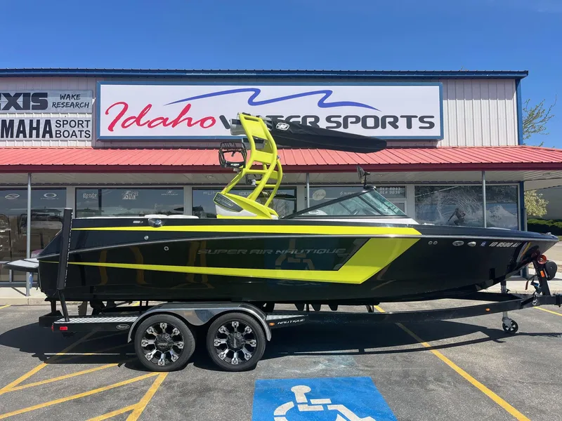 Slide: The Image of 2014 Correct Craft 230 TEAM EDITION boat at Idaho Water Sports dealership. - 2