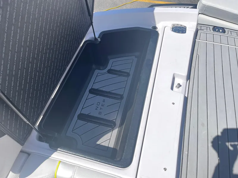 Slide: The Image of 2014 Correct Craft 230 TEAM EDITION boat storage compartment with "No Step" label. - 33