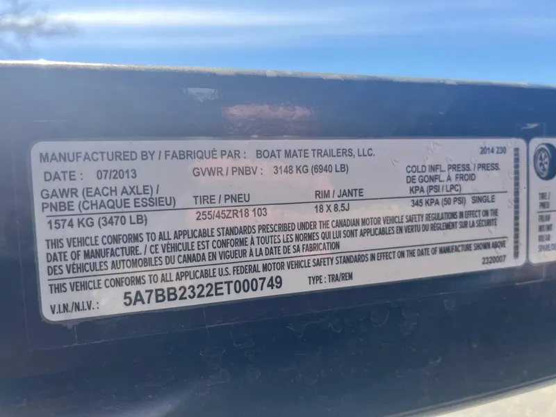 Slide: The Image of 2014 Correct Craft 230 TEAM EDITION trailer label with specifications and compliance details. - 37