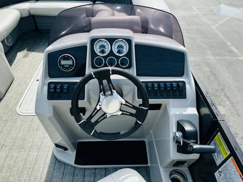 Slide: The Image of Steering console of 2021 L-Series L5 CLZ boat with gauges and controls. - 9