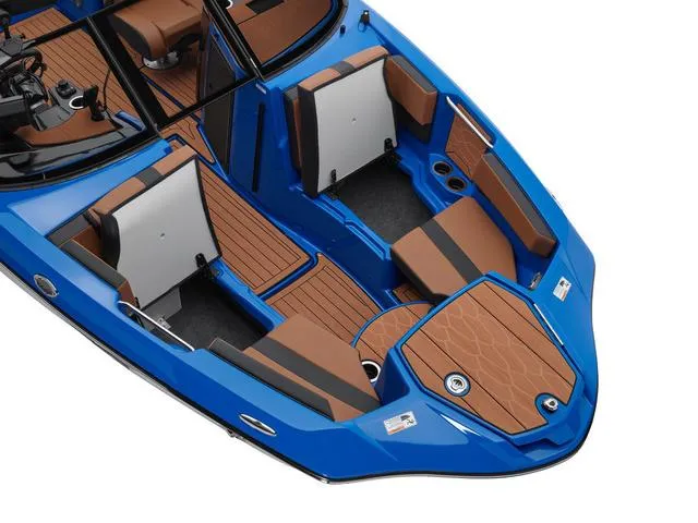 Slide: The Image of 2024 Yamaha Boats 222XD interior, featuring blue and brown seating with modern design. - 11