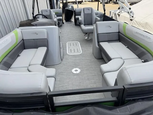 Slide: The Image of 2020 Bennington 22 SSRX pontoon boat with spacious seating and modern interior design. - 17