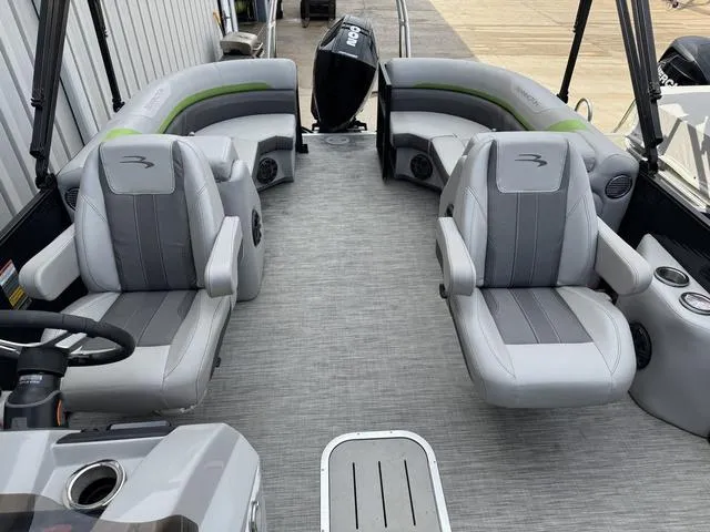 Slide: The Image of 2020 Bennington 22 SSRX pontoon boat interior with gray seating and modern design. - 9