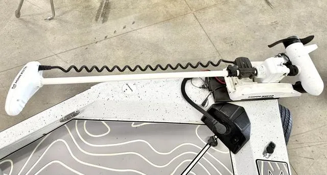 Slide: The Image of 2023 Xpress Boats H22B trolling motor on deck, featuring a sleek design and advanced technology. - 6