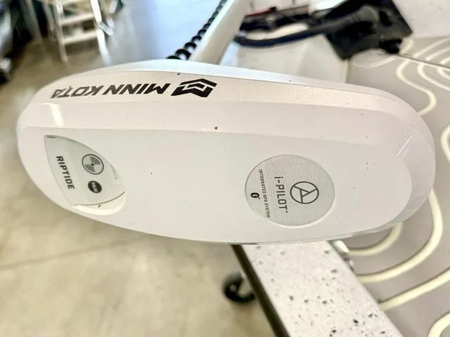 Slide: The Image of Minn Kota Riptide i-Pilot trolling motor on 2023 Xpress Boats H22B. - 7