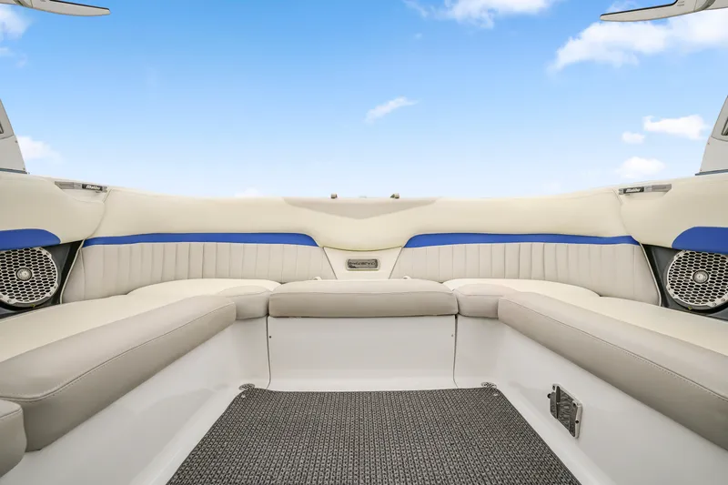 Slide: The Image of Interior of 2015 Malibu Wakesetter 24 MXZ boat with plush seating and speakers. - 12