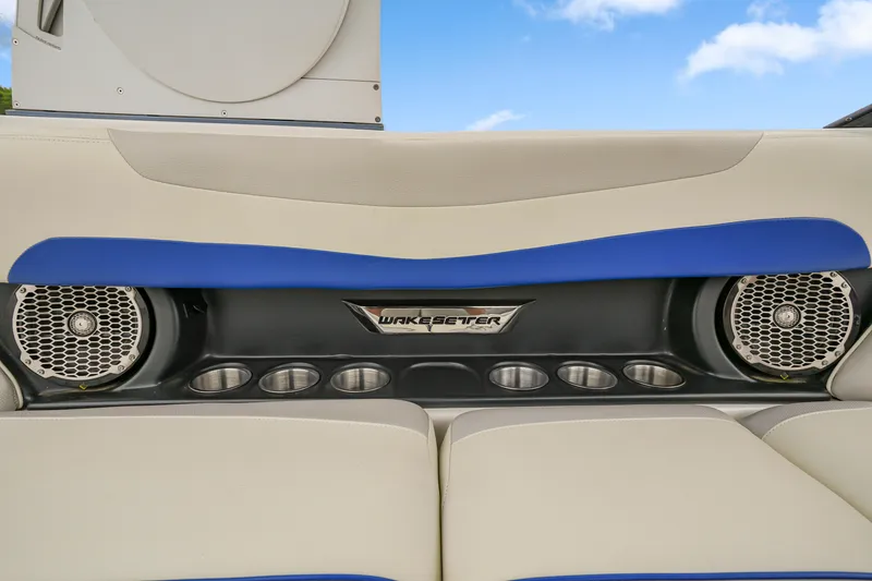 Slide: The Image of 2015 Malibu Wakesetter 24 MXZ interior with speakers and cup holders. - 14