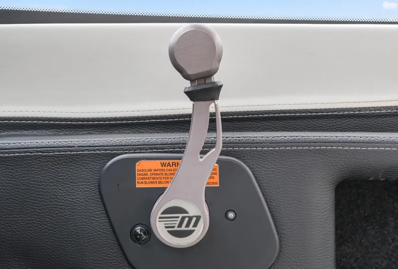 Slide: The Image of Throttle control lever on a 2015 Malibu Wakesetter 24 MXZ boat dashboard. - 4
