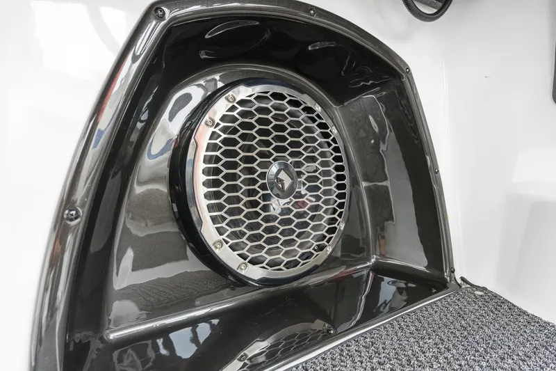 Slide: The Image of Speaker system in 2015 Malibu Wakesetter 24 MXZ boat, featuring sleek design and grille. - 9