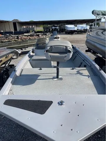 Slide: The Image of 2008 G3 1610 boat with seating, parked in a marina. - 3