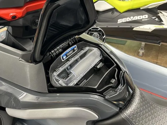 Slide: The Image of 2025 Sea-Doo Waverunner RXT-X storage compartment, open view, showcasing interior design. - 11