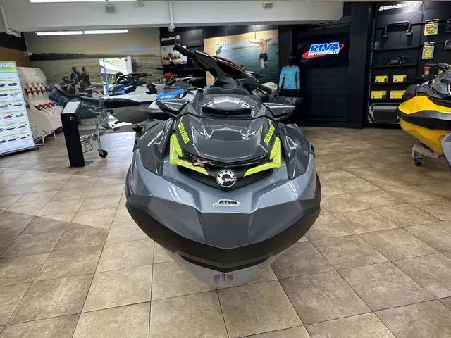 Slide: The Image of 2025 Sea-Doo Waverunner RXT-X on showroom floor, front view. - 8