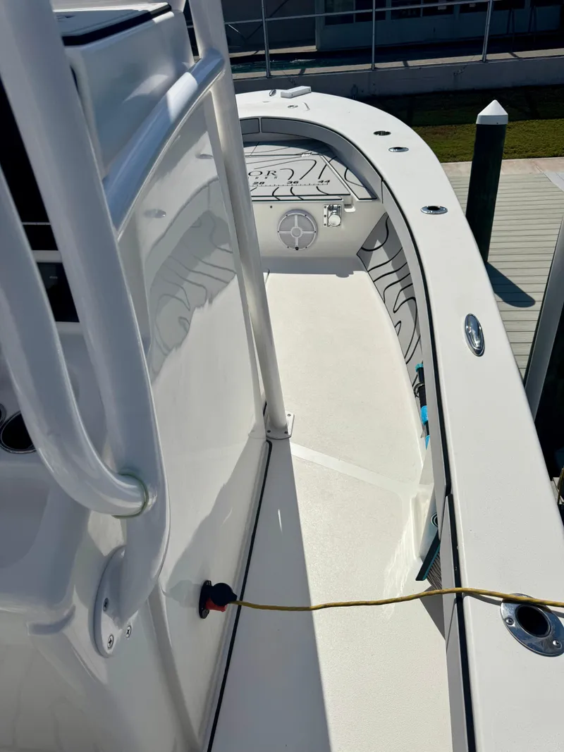 Slide: The Image of 2022 Xplor x24 Andros Mercury 300 boat with tower, docked, side view. - 14