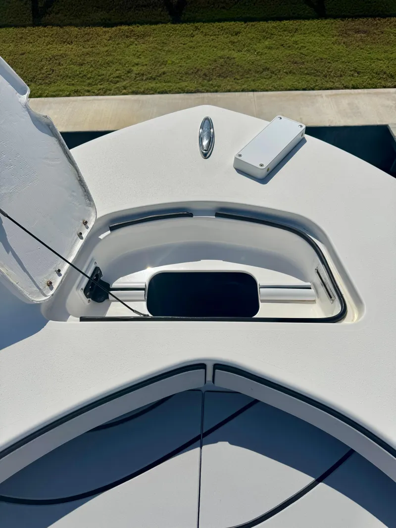 Slide: The Image of 2022 Xplor x24 Andros Mercury 300 boat deck with open hatch and tower, 155 hours. - 18
