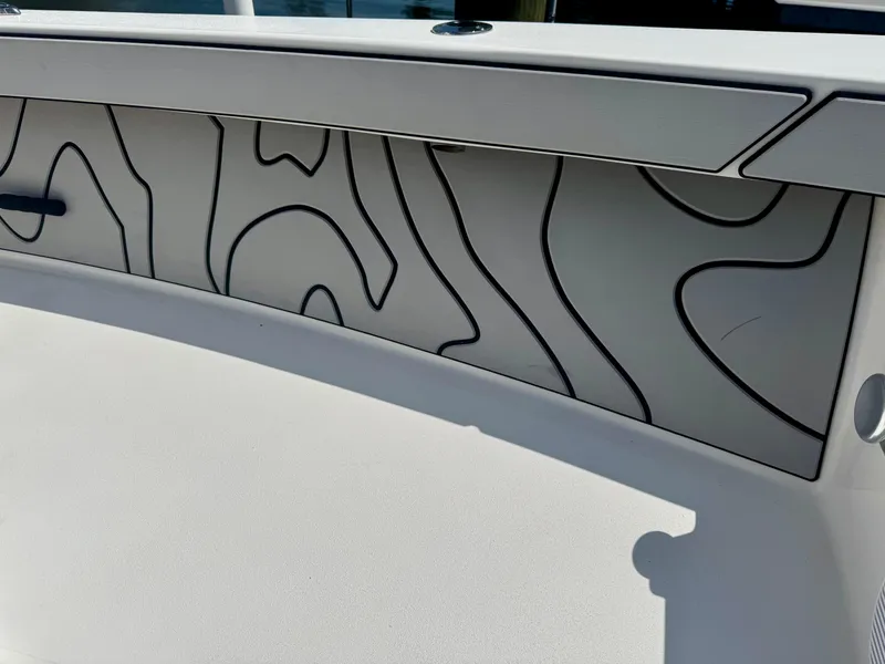 Slide: The Image of 2022 Xplor x24 Andros Mercury 300 boat with unique contour design detail. - 22