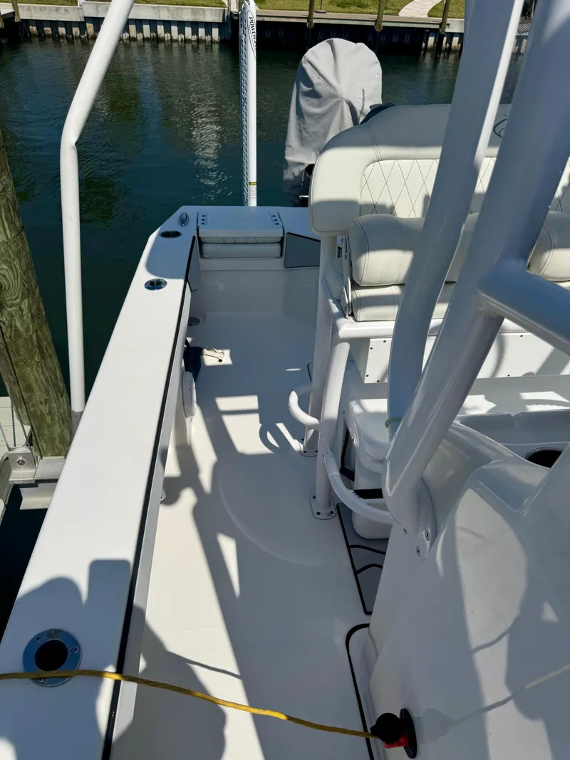 Slide: The Image of 2022 Xplor x24 Andros Mercury boat with tower, docked in marina. - 28