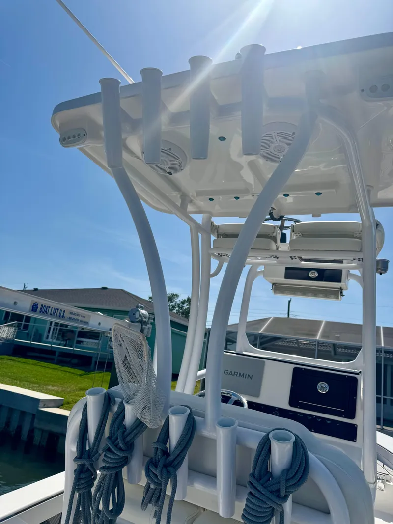 Slide: The Image of 2022 Xplor x24 Andros Mercury 300 boat with tower, docked under sunny sky. - 33