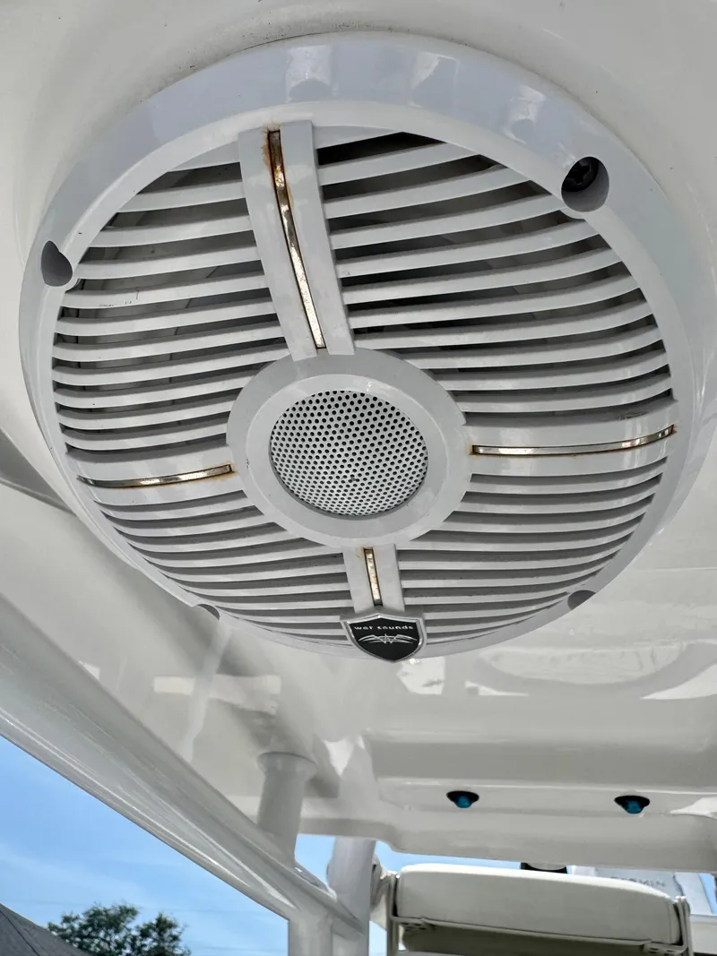 Slide: The Image of Close-up of a marine speaker on a 2022 Xplor x24 Andros Mercury boat. - 34