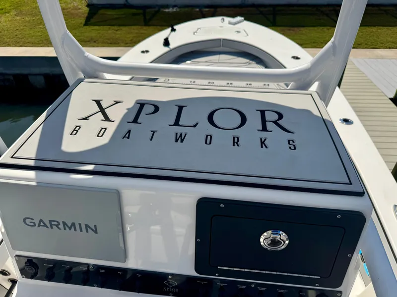 Slide: The Image of Xplor x24 Andros Mercury 300 boat dashboard with Garmin system, 2022 model. - 37