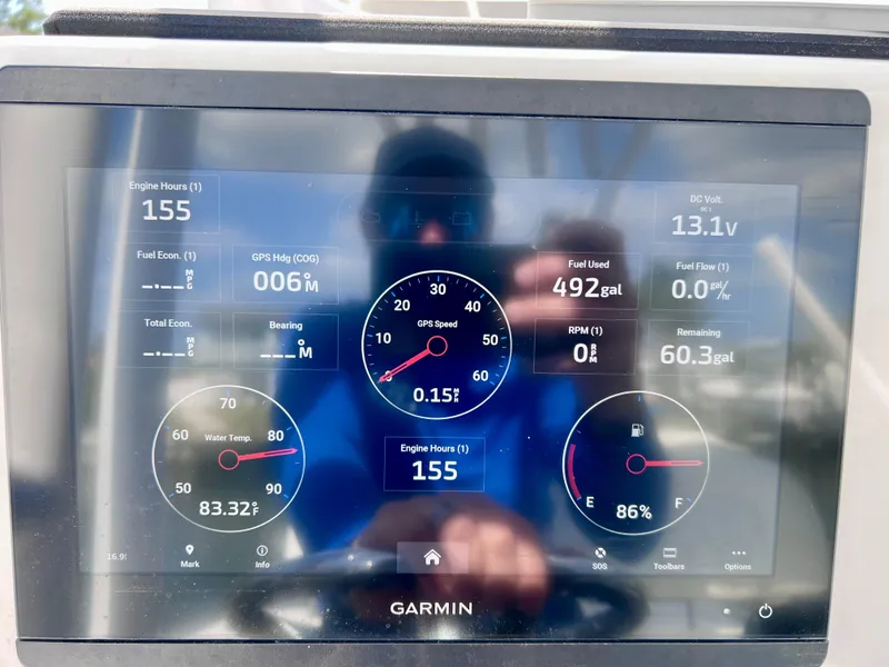 Slide: The Image of Garmin display on Xplor x24 Andros Mercury 300 showing engine metrics and fuel data. - 41