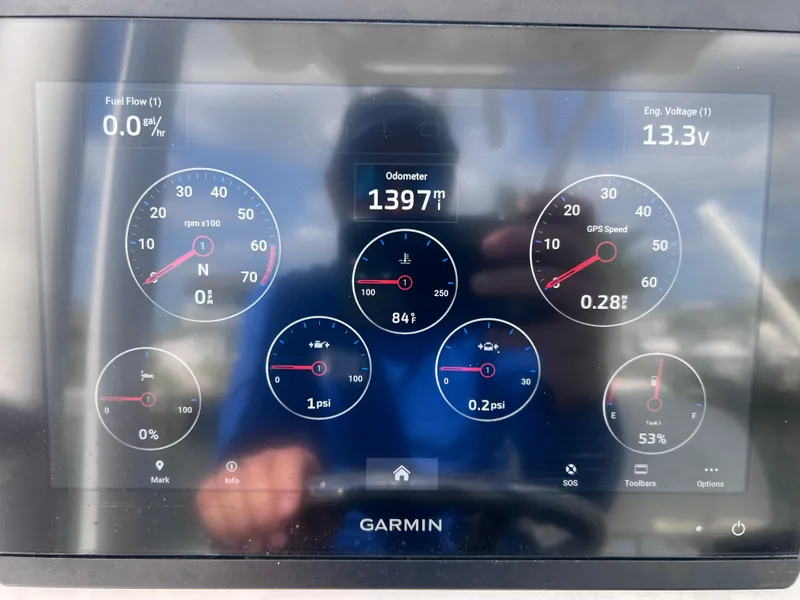 Slide: The Image of Garmin display showing boat metrics for 2022 Xplor x24 Andros Mercury 300. - 42