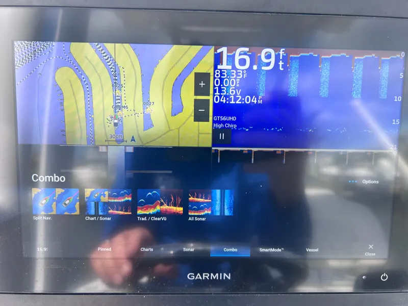 Slide: The Image of Garmin marine display showing navigation and sonar data on Xplor x24 Andros Mercury 300, 2022 model. - 43