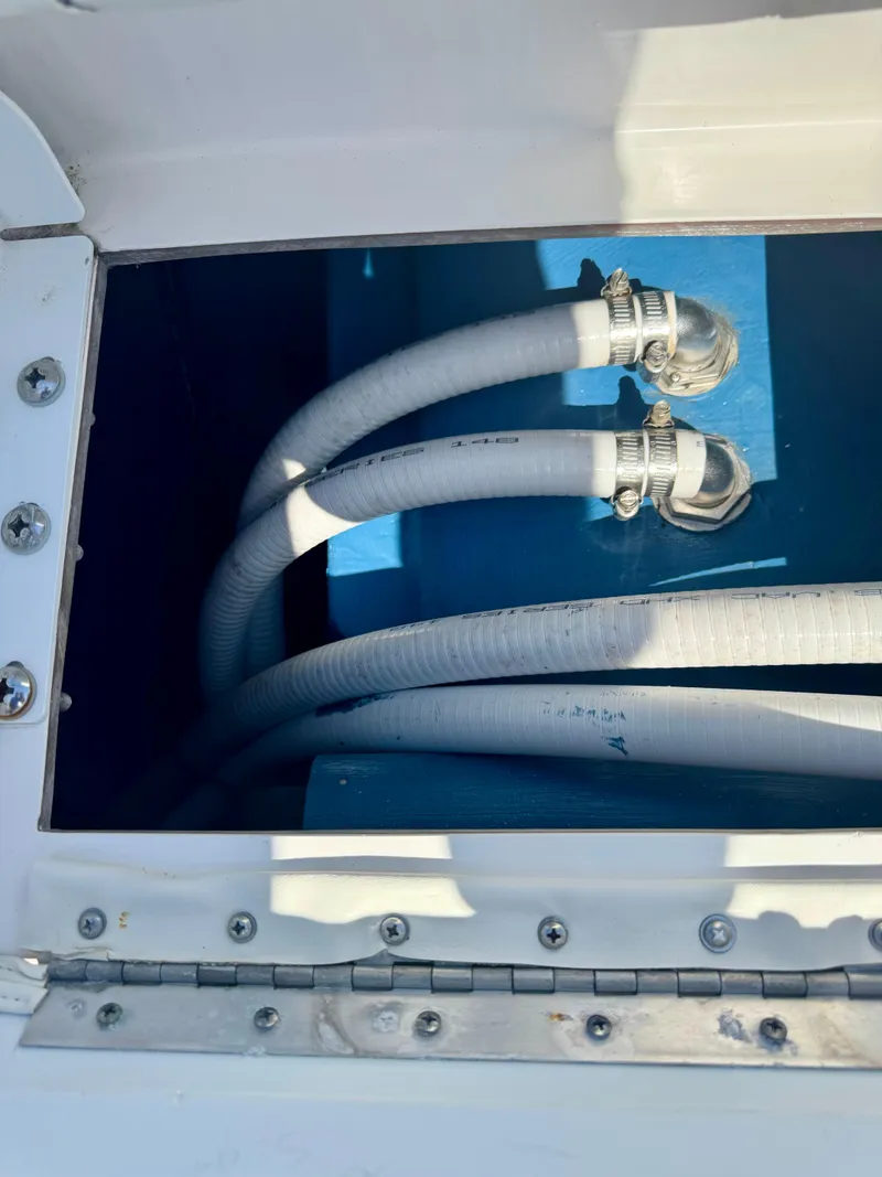 Slide: The Image of Boat compartment with hoses, Xplor x24 Andros Mercury 300, 2022 model. - 48