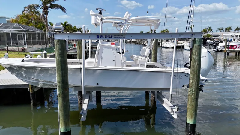 Slide: The Image of 2022 Xplor x24 Andros Mercury 300 boat with tower, docked in marina. - 5