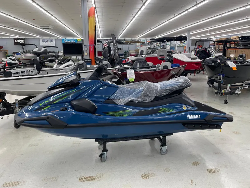 Slide: The Image of 2025 Yamaha WaveRunner VX Cruiser HO in showroom, blue color, side view. - 1