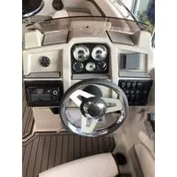 Slide: The Image of 2023 Starcraft SVX 191 OB boat dashboard with steering wheel and control panel. - 3