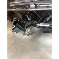 Slide: The Image of 2024 Starcraft MVX Surf boat's rear view showing propeller and engine components. - 13