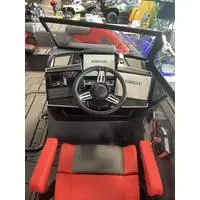 Slide: The Image of 2024 Starcraft MVX Surf boat interior with steering wheel and red seating. - 4