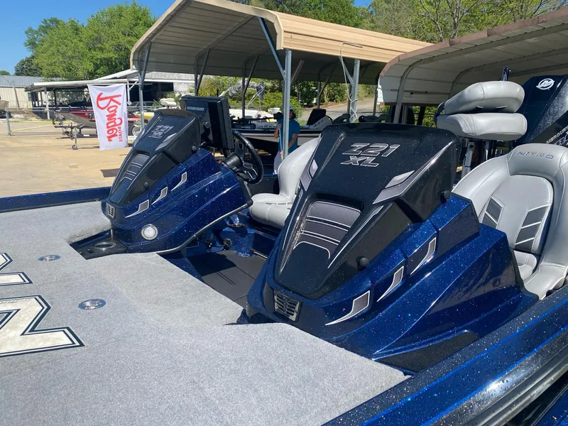 Slide: The Image of 2022 Nitro Z21 XL Pro boat with dual consoles and sleek design. - 8