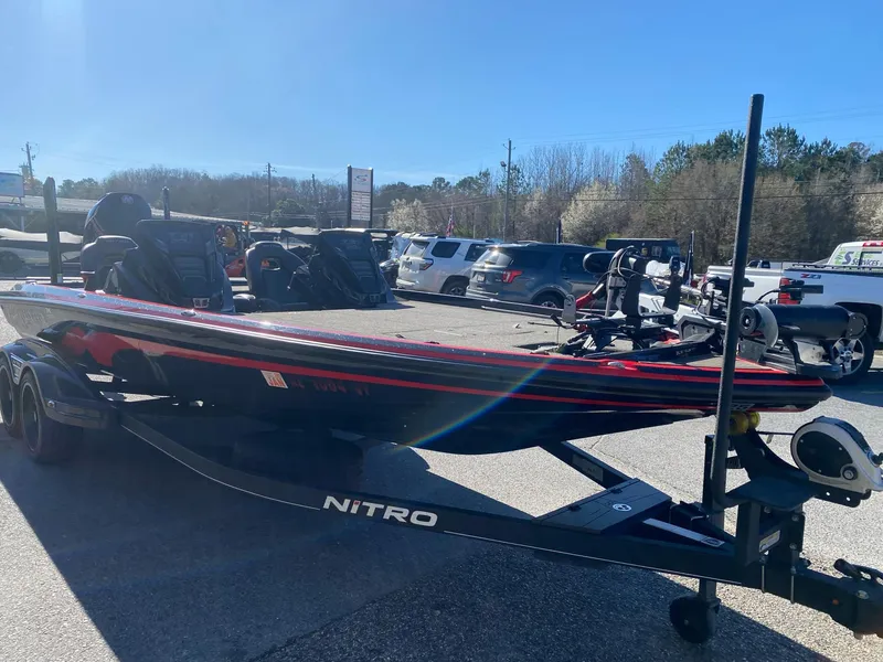 Slide: The Image of 2023 Nitro Z21 XL Pro boat on trailer in parking lot. - 3