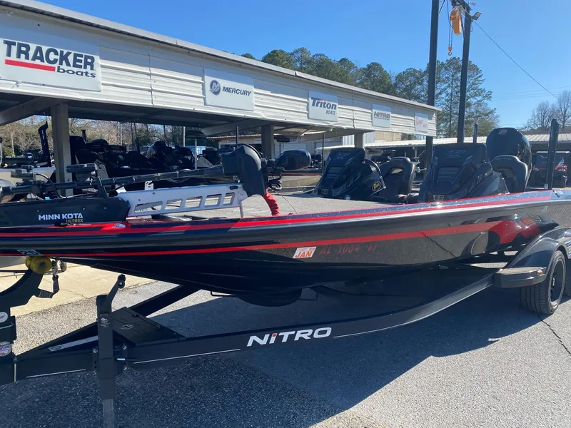 Slide: The Image of 2023 Nitro Z21 XL Pro boat displayed at dealership, featuring sleek design and modern features. - 4
